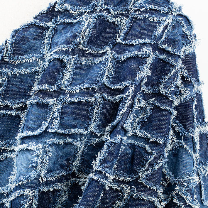 Detail of Tie-Dye Checkered Textured Denim Fabric
