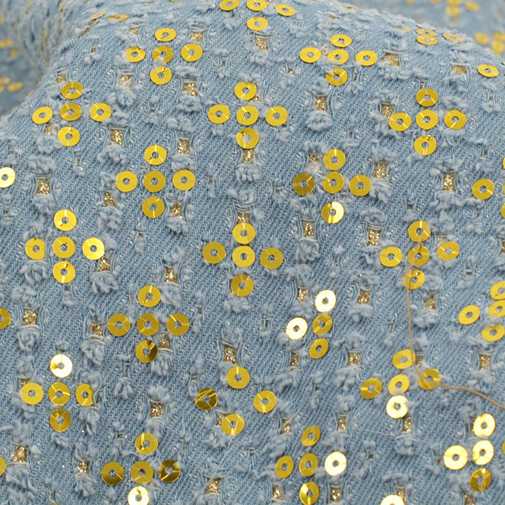 Detail of Gold and Silver Sequins Denim Fabric